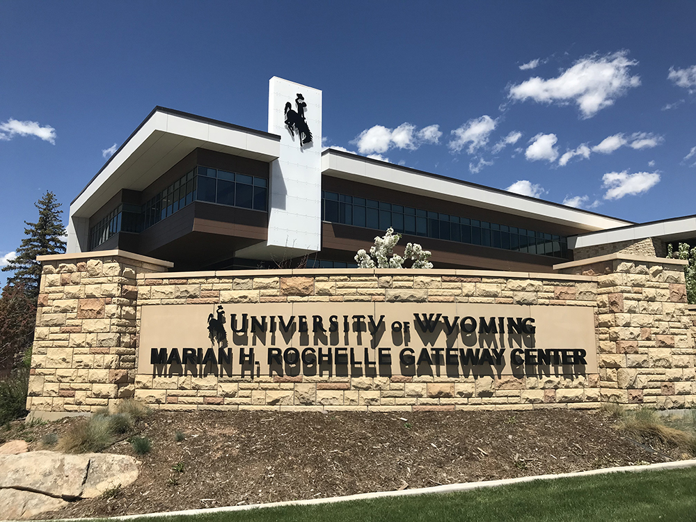 U of Wyoming horse & rider logo